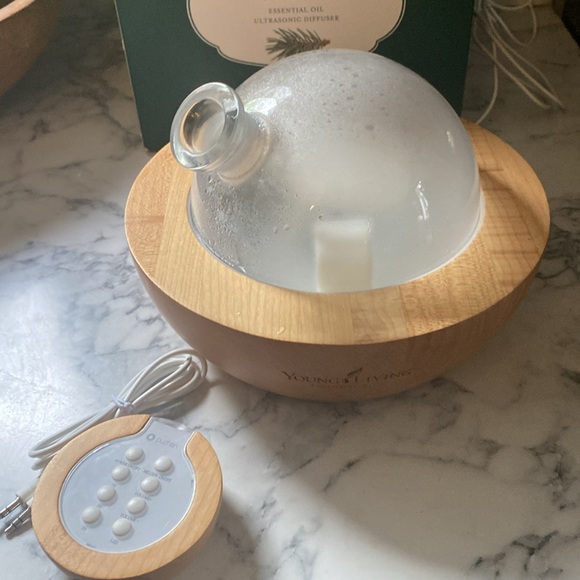 Young Living Other - Young Living Aria Ultrasonic Diffuser Great condition. Remote and audio cable.